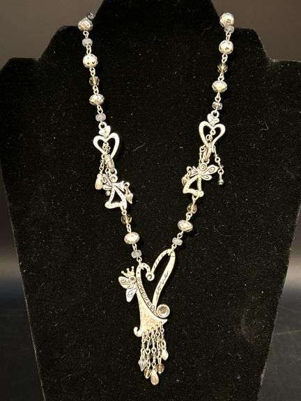 Chico’s silver-tone angel playing harp Love necklace image