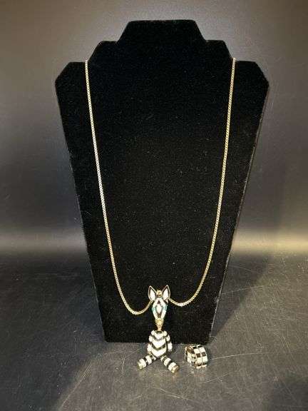 Betsey Johnson box chain with animated zebra pendant and a pair of black/white stone earrings image
