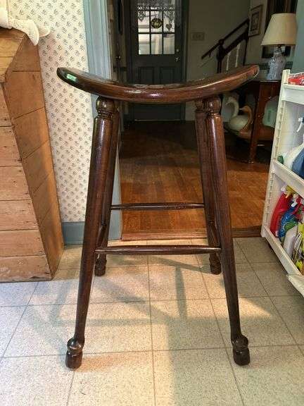 Solid hardwood saddle seat stool…..20-1/2 x 12-1/2 x 31 tall…..slight blemishes from normal use but solid piece image