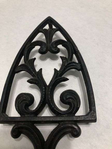 Vintage 1955 JZH Black Cast Iron Footed Trivet Cathedral T-12 R. 8.5 x 3.75”.