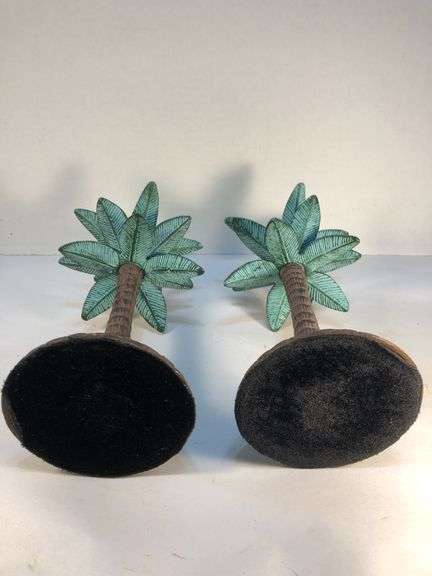 Unusual vintage pair of cast iron palm tree candle holders. Green and brown. 7 3/4” H. Base 4”W.