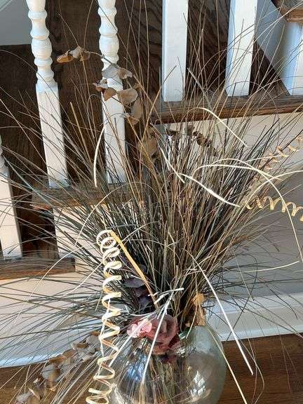 Clear glass urn with artificials…..approx. 46” tall including artificials