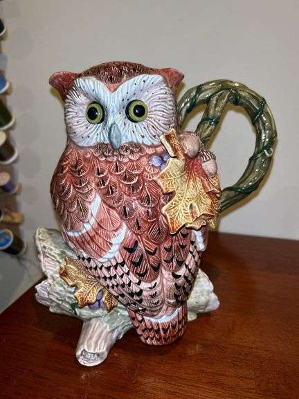 (2) very nice owl home decor items…..left is a pitcher by Fitz & Floyd and stands 8-3/4” tall (1 tiny chip on back log)…..right is an Opa’s Haus Inc. Edition owl themed stein  from The American Wildlife Stein Series (9” tall)