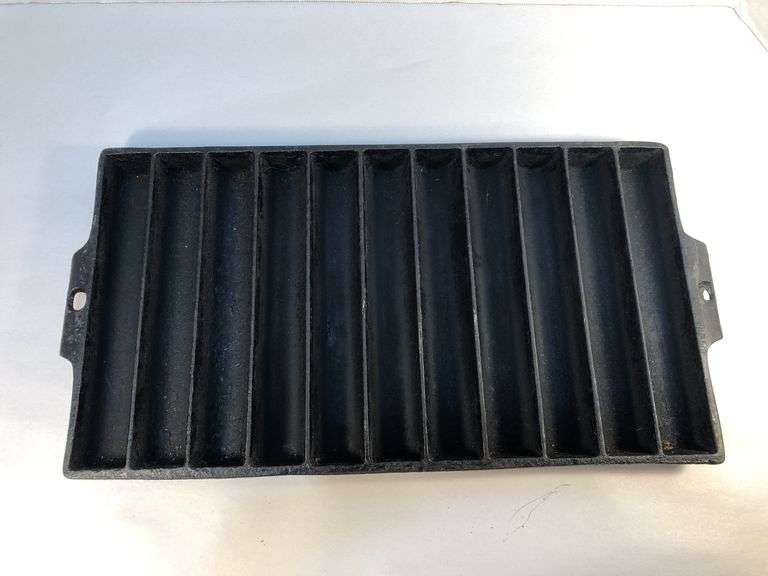 Vintage Griswold 11 stick cast iron cornbread stick pan. 14 3/8 x 7 1/4”. A on underside of one handle. image