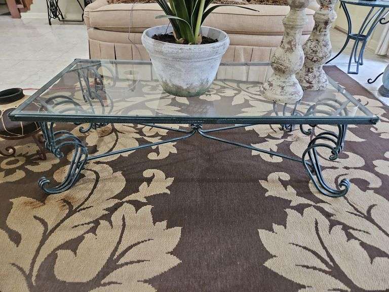 Very nice 48x24x15 wrought iron glass top table CONTENTS ON TOP NOT INCLUDED... image