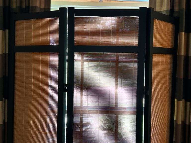 Wooden tri-fold screen with faux bamboo fillers on each panel……each panel measures 16” and is 71” tall