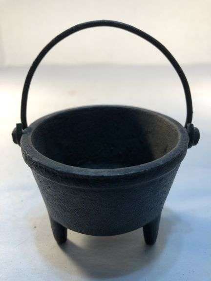 Vintage Wilton miniature 3 legged cast iron kettle with bail. 1 7/8” h x 2.5” w. image
