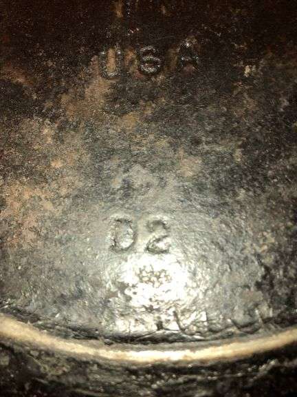 Griswold No. 8 cast iron skillet, identifiable by the "8-B" and "MADE IN USA". MM: D2