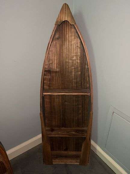 Collection of boat shaped shelving in various sizes