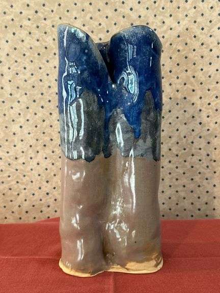 Beautifully designed and handcrafted Owl Eyes Pottery glaze drip vase (has appearance of dripping candle wax)…..9-1/2” tall….Owl Eyes Pottery are pieces designed by the seller and are food safe….has (1) firing defect
