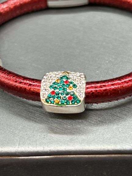 Elegant Brighton bangle with rhinestone Christmas tree charm and 2 red stone separators…..has magnetic closure and bag