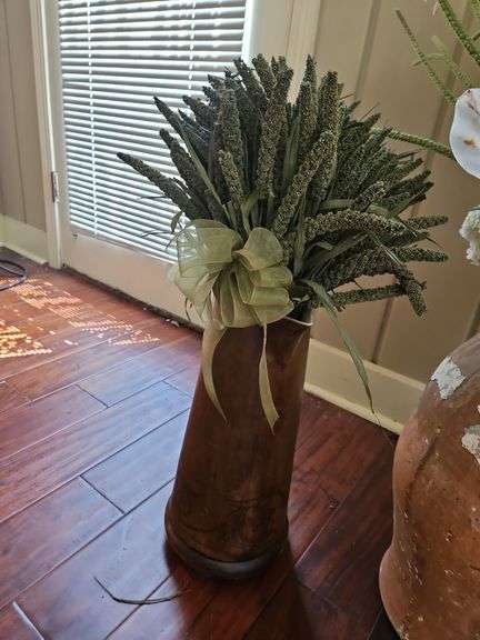 Group of potted artificial plant arrangements... image