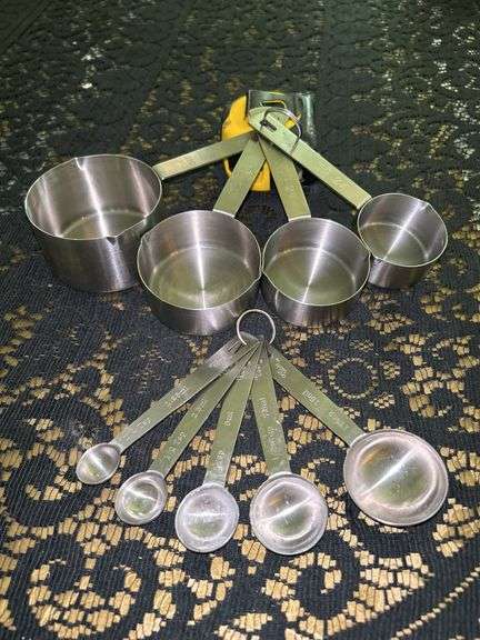 Set of (5) Our Table stainless measuring spoons and set of (4) Our Table stainless measuring cups image