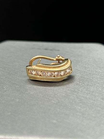 14K yellow gold scrap lever back earring with clear stones…..3 grams image