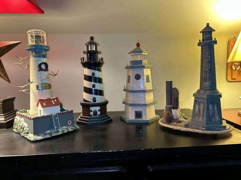 Nice selection of lighthouses made from various materials…..far left is musical (needs batteries, far right is a bank…..heights range from approx. 12-1/2 to 13-1/2” tall image