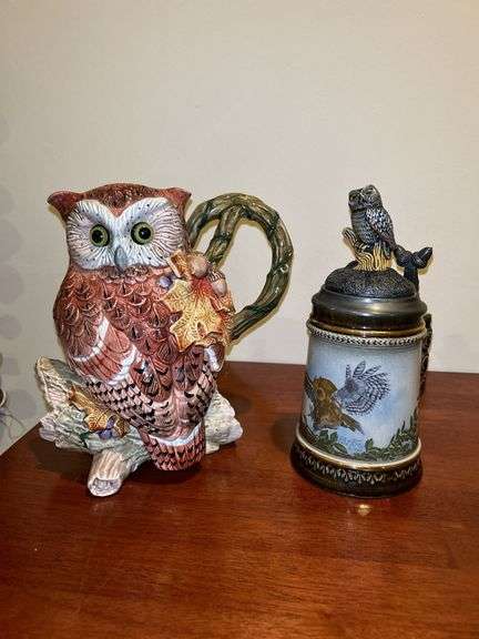 (2) very nice owl home decor items…..left is a pitcher by Fitz & Floyd and stands 8-3/4” tall (1 tiny chip on back log)…..right is an Opa’s Haus Inc. Edition owl themed stein  from The American Wildlife Stein Series (9” tall)