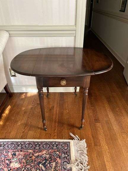 Statton TruType Americana single drawer drop leaf side table with brass casters…..does have spotting on top…..sides down 19 x 27-1/2 x 26-1/2 tall….side up 35-3/4w