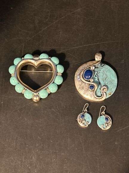 4-piece turquoise set…..heart pendant, round turquoise/silver toned pendant and matching earrings image
