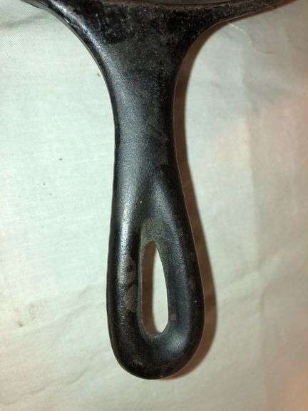 Griswold No. 8 cast iron skillet, identifiable by the "8-B" and "MADE IN USA". MM: D2