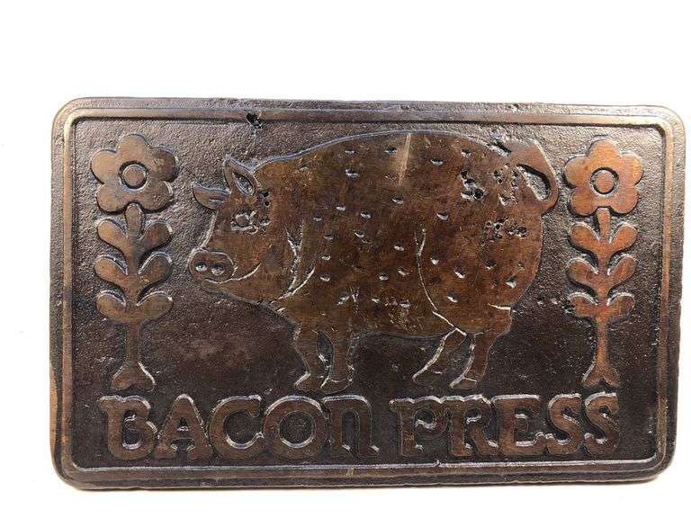 1978 Taylor & Co. bacon press.  Wooden handle. Decorative bottom; pig and floral 7.5 x 4.5”
