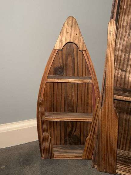 Collection of boat shaped shelving in various sizes