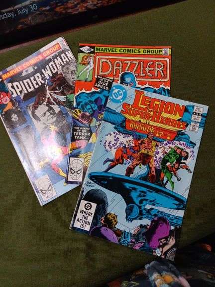 Set of 3 comics in good condition, Dazzler number 5, Spider woman Number thirty two and Legion of the super heroes number two eighty seven have been kept in sleeves image