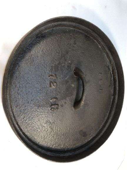 Antique No.1  12” cast iron lid for Dutchoven. Gate marked. Marked KO.