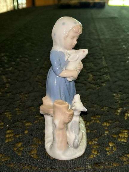 Vintage Porcelain Figurine of Girl in Blue Dress Holding White Bunny Rabbit with Dog by her side….5-3/4” tall….original label which reads by Lego