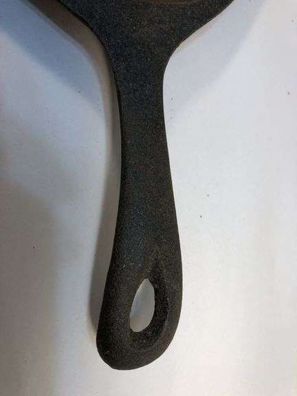 Oval fajita skillet/sizzler 15” L.  9.5 x 7” cooking surface. 0 on underside of handle is the only marking.