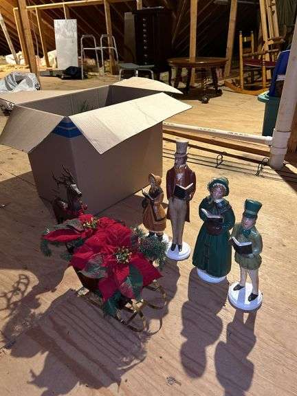 Beautiful grouping of Christmas decor…..box of greenery and ribbon, hammered metal deer, (4) great looking ceramic carolers and sleigh with artificial poinsettias