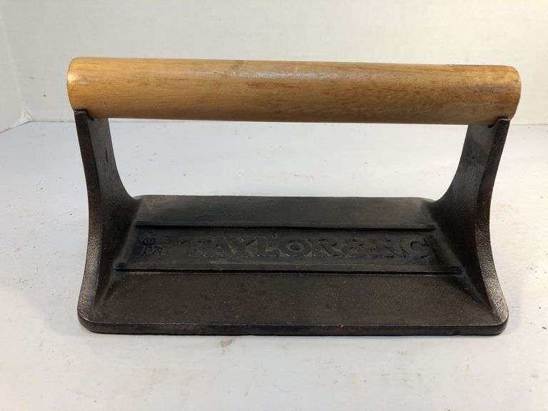 1978 Taylor & Co. bacon press.  Wooden handle. Decorative bottom; pig and floral 7.5 x 4.5”