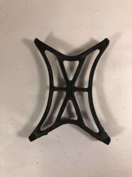 Antique cast iron black trivet. 5” x 3.5”
