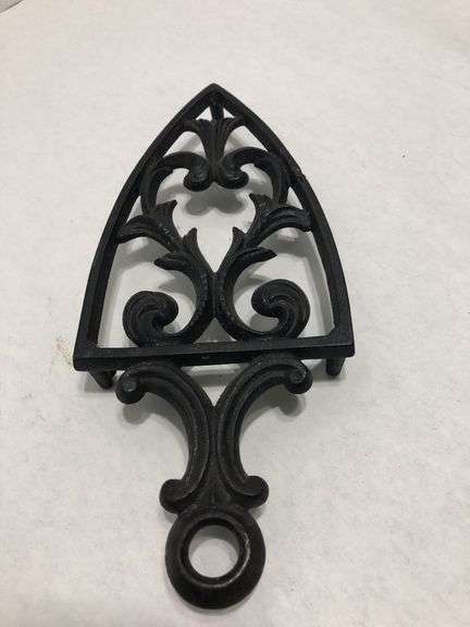 Vintage 1955 JZH Black Cast Iron Footed Trivet Cathedral T-12 R. 8.5 x 3.75”.
