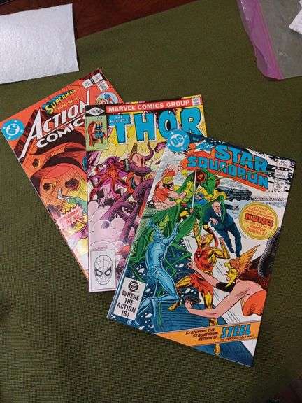 Set a three comic books All Star Squadron number eight, Thor number three ten, and suplerman  number five thirty good condition see description image