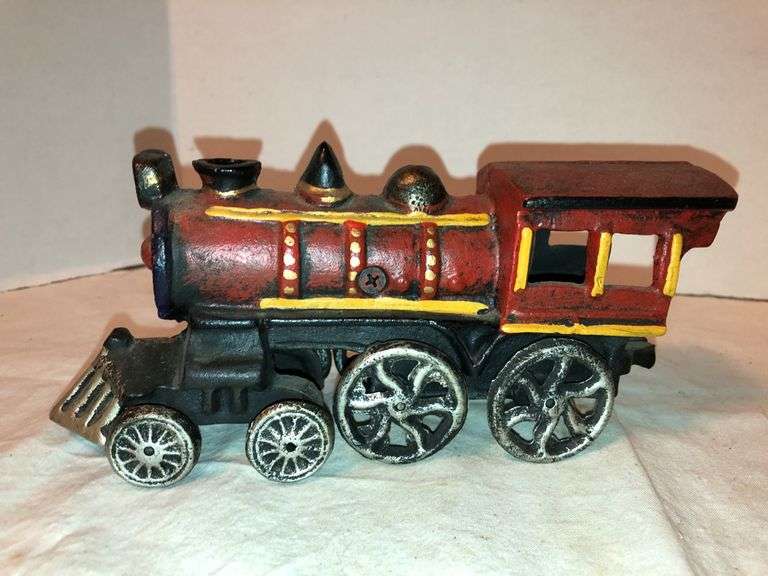 Vtg cast iron steam engine locomotive. Red, black, yellow, and silver. 8” L x 2.5” W x 3.5”H image