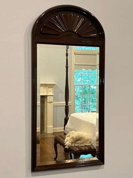 Mahogany finish beveled mirror with fan design at top…..18 x 38 image