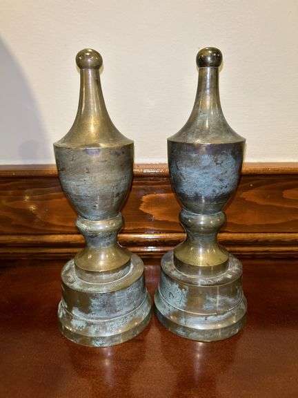 Pair of decorative bronze-like finial mantle pieces…..11” tall…..these are not solid brass image