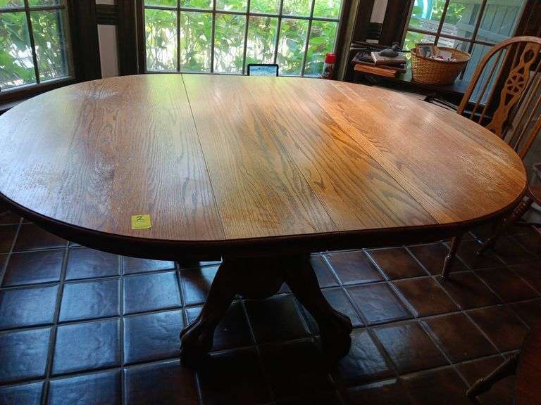 Oak claw foot dining table with 4 chairs see description image