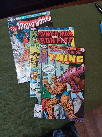 Set of 3 comic books.Great condition have been kept in sleeves.Spider woman number 37, Powerman and Iron fist Number seventy and The Thing number seventy image
