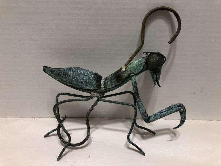 Metal garden grasshopper. Copper with green patina. 8” x 8” overall. Body 6” L