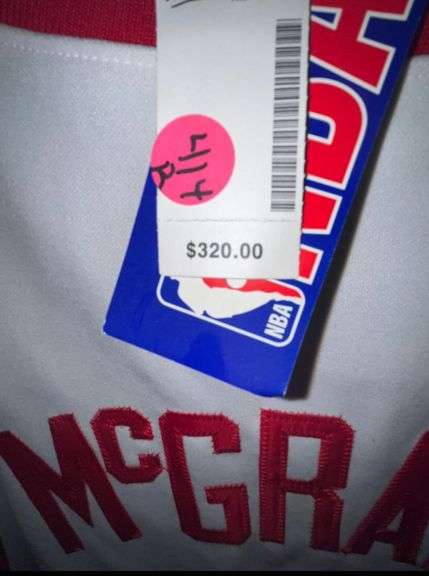 Official NBA jersey #1 McGrady size 57. NWT