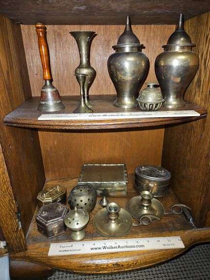 Collection of brass items... image