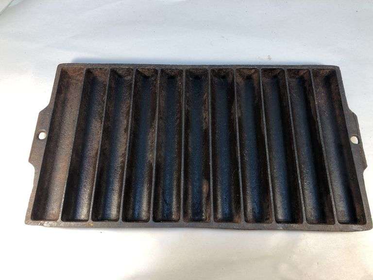Vintage Griswold No. 22, 11 stick cornbread pan. # 954. Weinstein PA. USA 14.5 x 7.5” image