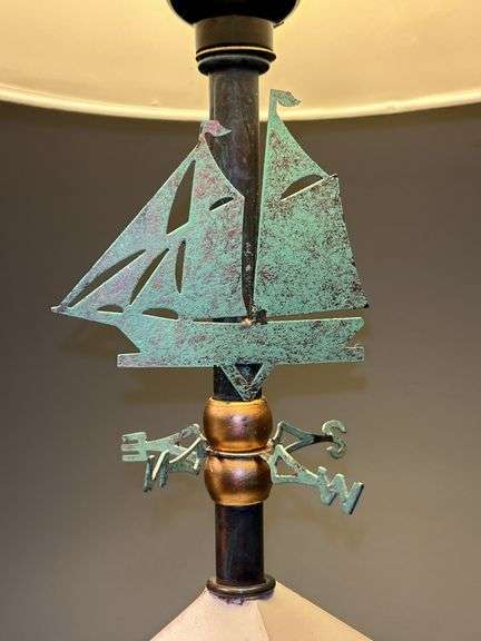 Pair of matching wood base lamps with metal weathervane decor…..16” tall