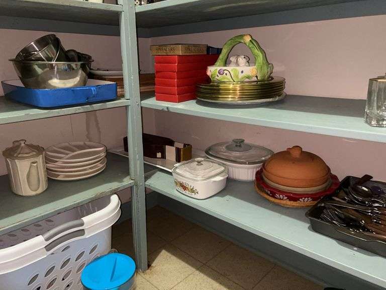 Large selection of kitchen and household items located on 2 shelves in pantry image