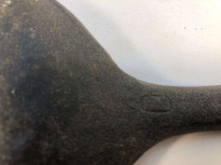 Oval fajita skillet/sizzler 15” L.  9.5 x 7” cooking surface. 0 on underside of handle is the only marking.