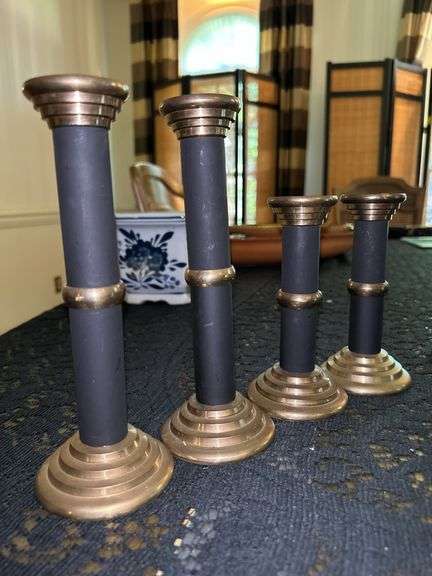 Grouping of various size and style candlesticks…..from 6 to 16” tall….some have brass