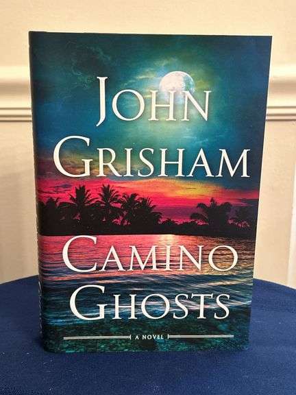 First Edition John Grisham “Camino Ghosts” hardback with satin finish dust jacket…..in like new condition image