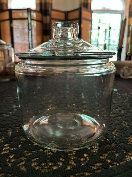Clear glass apothecary jar with lid….6-3/4”D x 8-1/2” tall image