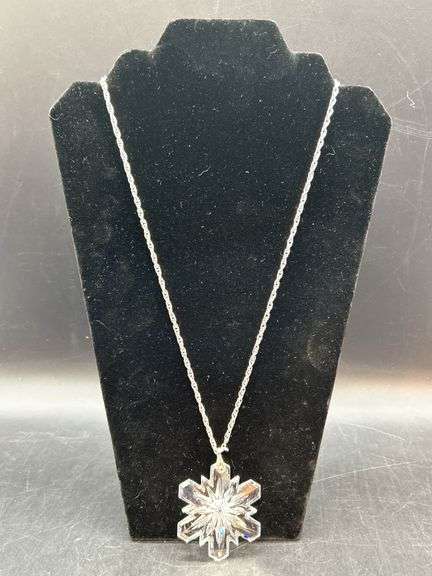 Dress up or dress down this glass snowflake necklace image
